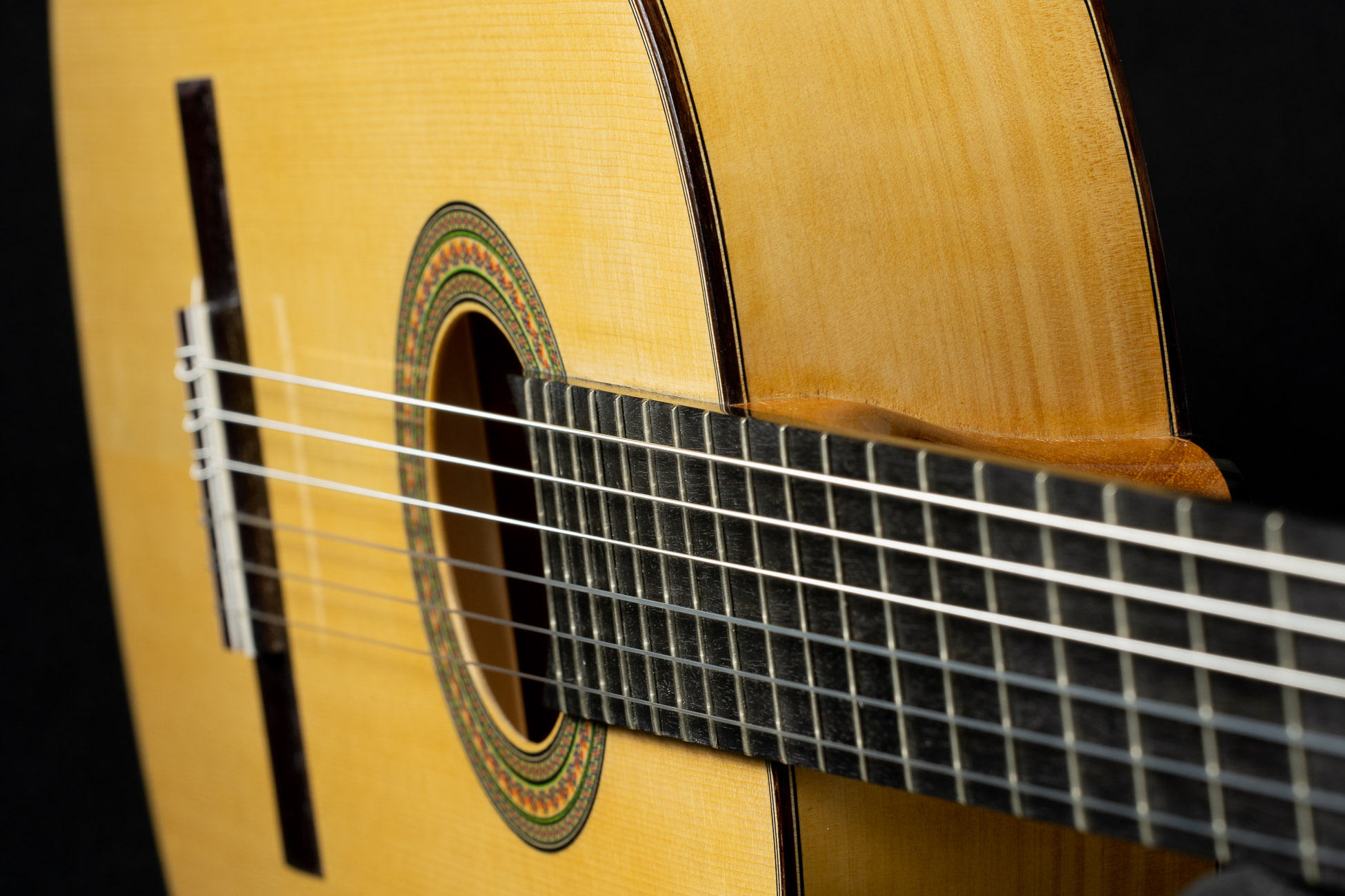 How to know the right string height on a classical guitar