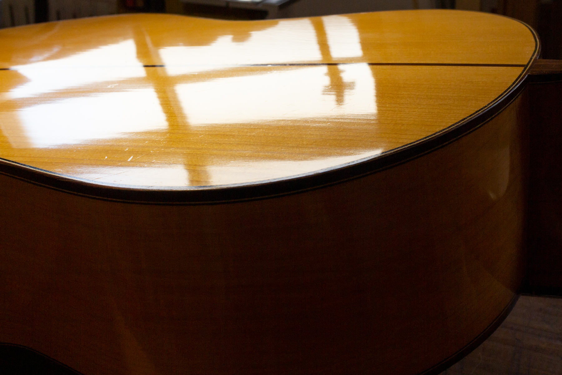 Scratches are very common on French polished guitars